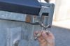 Cabinet key integr. bottle-opener